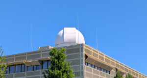 OST observatory dome on the root of the institute for physics and astronomy with blue sky